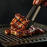 Grilled Meat Flipping With Tongs sound effect artwork