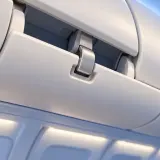 Airplane overhead compartment door latching sound effect artwork