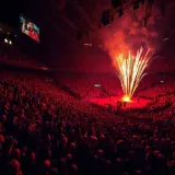 Massive Crowd Roaring with Rapid Pyrotechnic Pops sound effect artwork